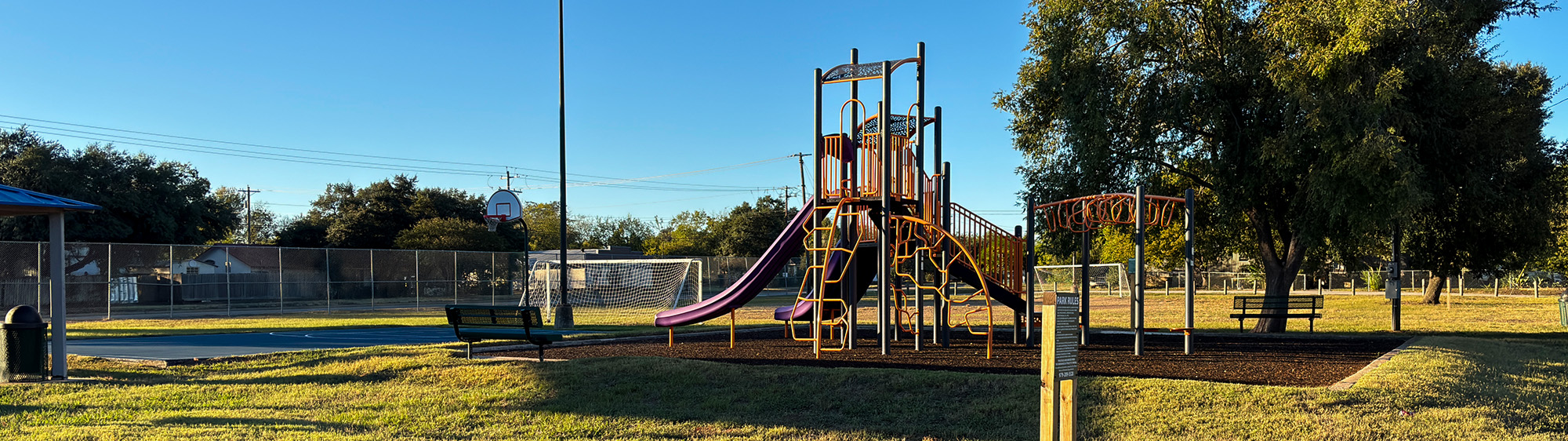 Playground and trees at Ibarra Park.