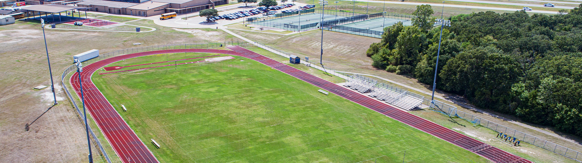 Aerial photo of a soccer field and track at Sam Rayburn Park