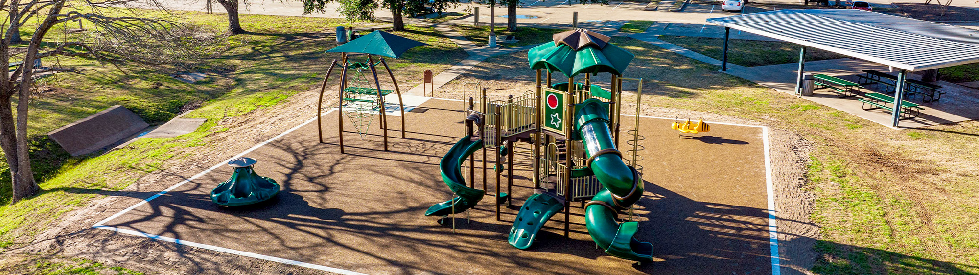 Aerial of playground and pavilion at Sadie Thomas Park
